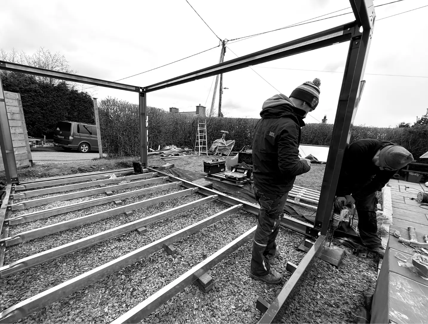 Rob and Rich building a Caban garden room on site